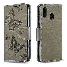 Coque Portefeuille Papillon Livre Cuir Etui Clapet B01F pour Samsung Galaxy M20 Gris